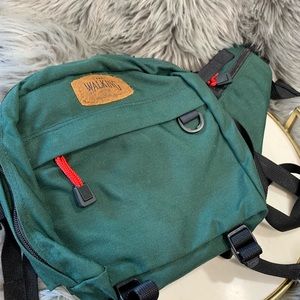 Green fanny pack walking